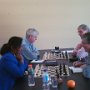 Kevin Perrin employs the English opening against Max Mollard, while David Schepisi seems to like Vineetha's blue outfit